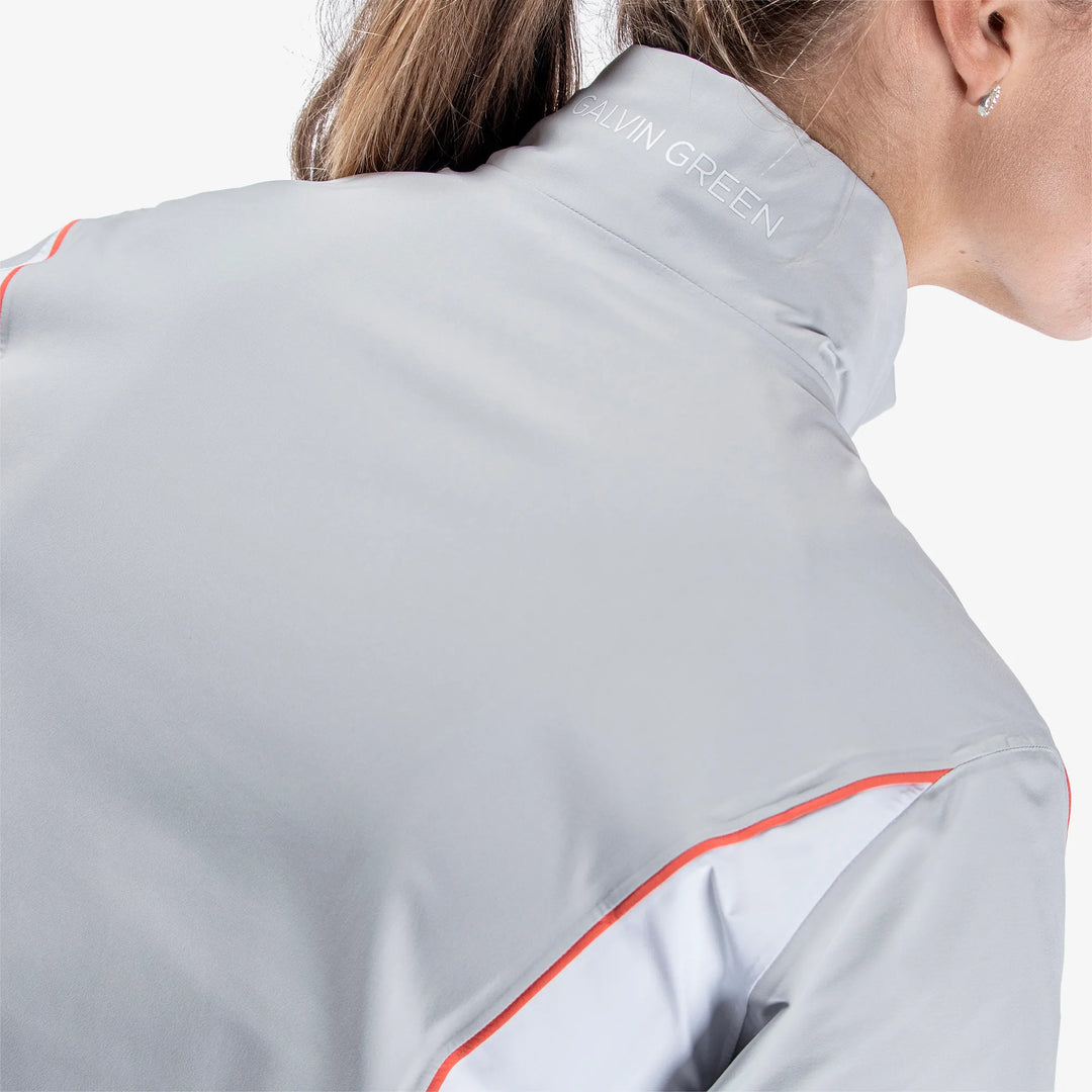 Ally is a Waterproof golf jacket for Women in the color Cool Grey/White/Coral(6)