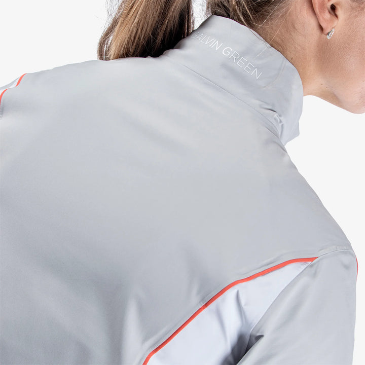 Ally is a Waterproof golf jacket for Women in the color Cool Grey/White/Coral(6)