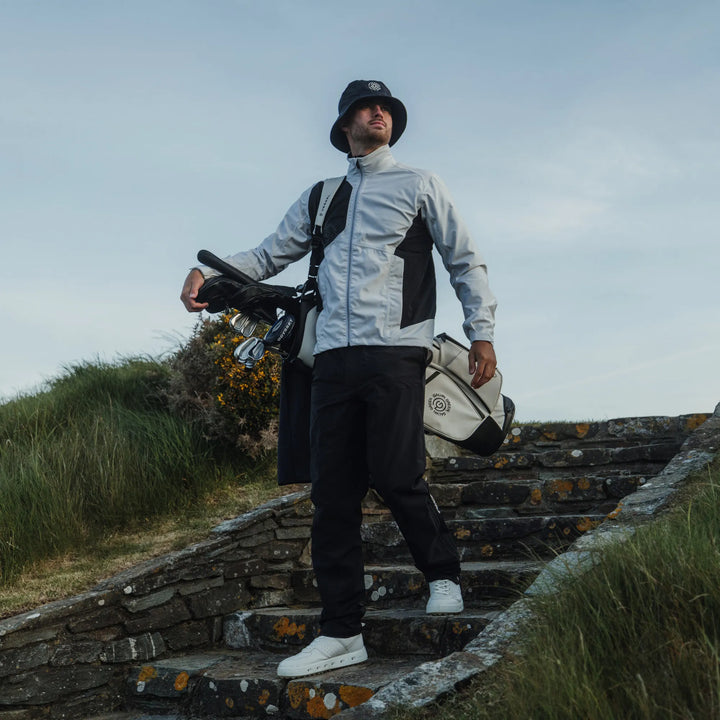 Ames is a Waterproof golf jacket for Men in the color White/Black(10)