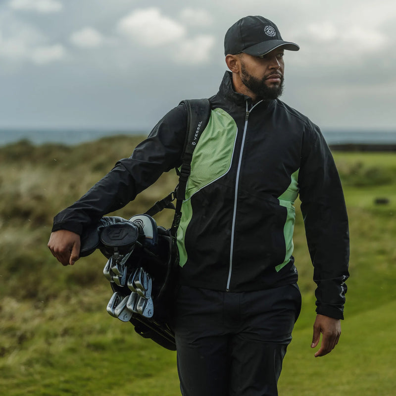 Ames is a Waterproof golf jacket for Men in the color Black/Fresh Green(9)