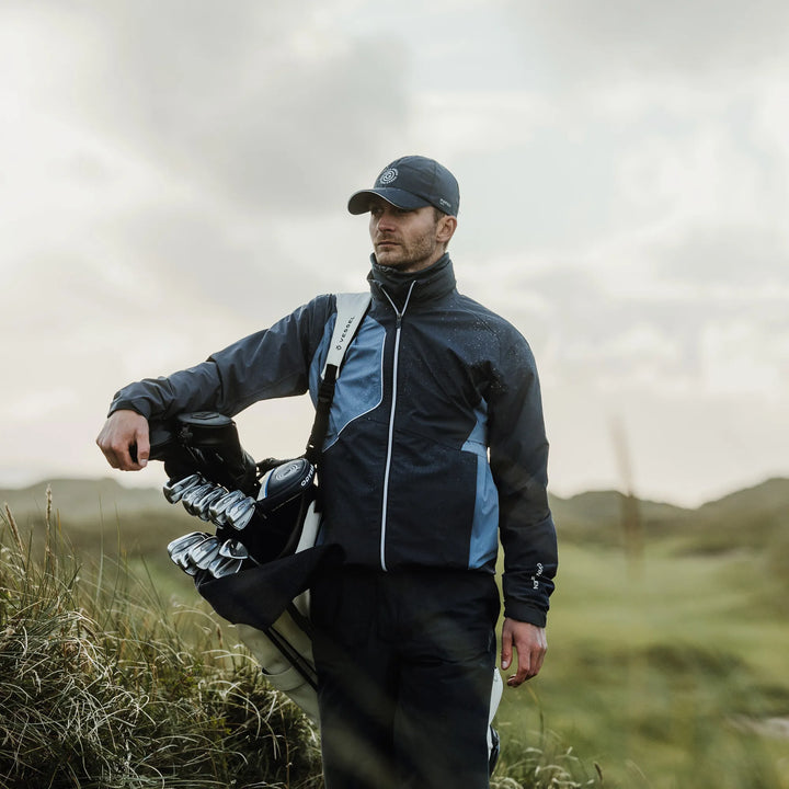 Ames is a Waterproof golf jacket for Men in the color Navy/Moonlight Blue(9)