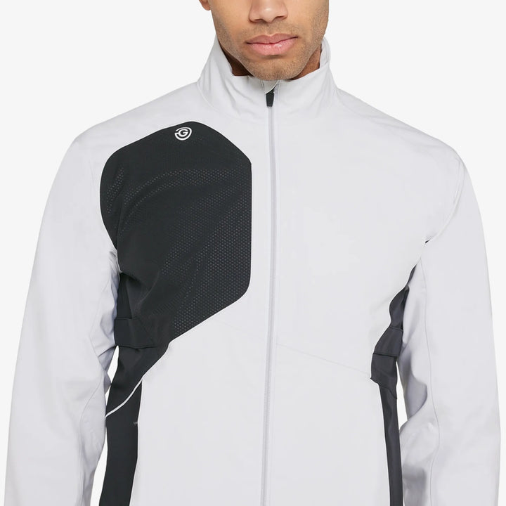 Ames is a Waterproof golf jacket for Men in the color White/Black(3)