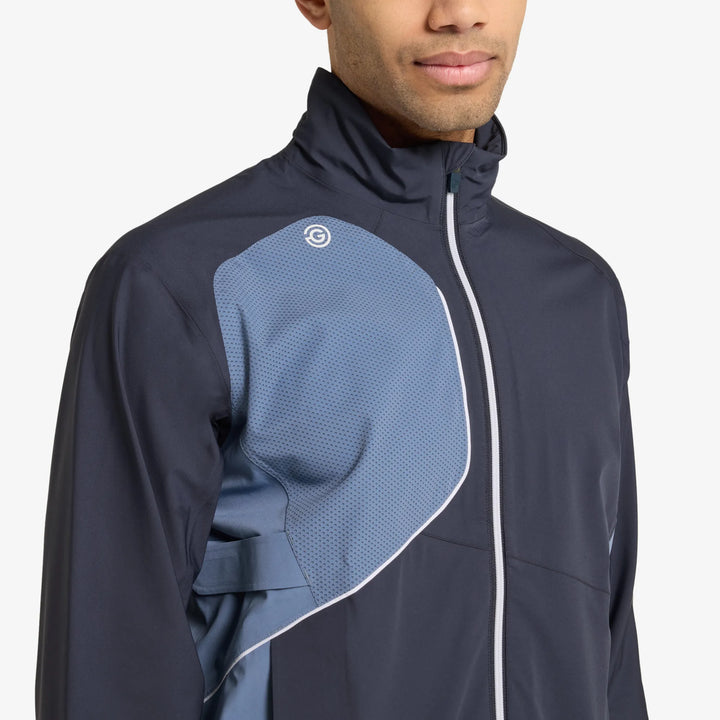 Ames is a Waterproof golf jacket for Men in the color Navy/Moonlight Blue(4)