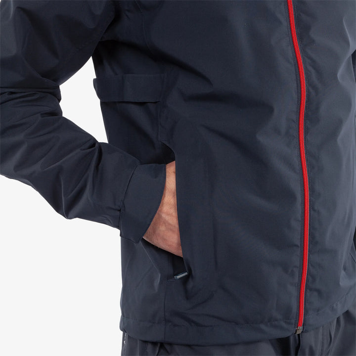 Anton is a Waterproof golf jacket for Men in the color Navy/Red(3)
