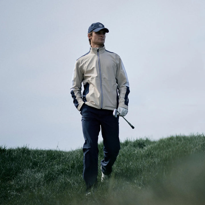 Arlo is a Waterproof Golf Jacket for Men in the color Sand/Navy/white(7)