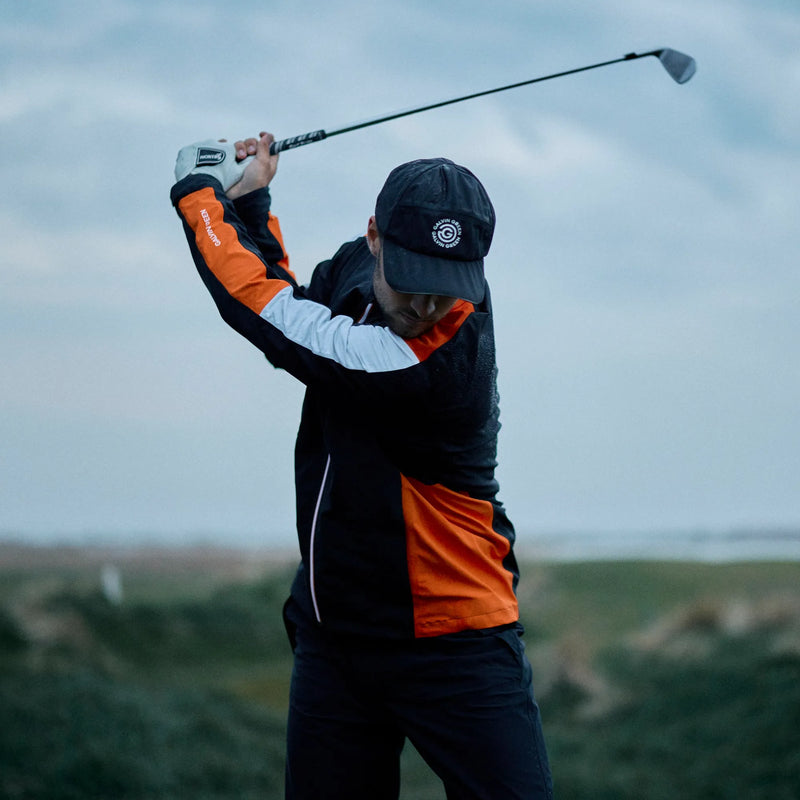 Arlo is a Waterproof Golf Jacket for Men in the color Black/Orange(7)