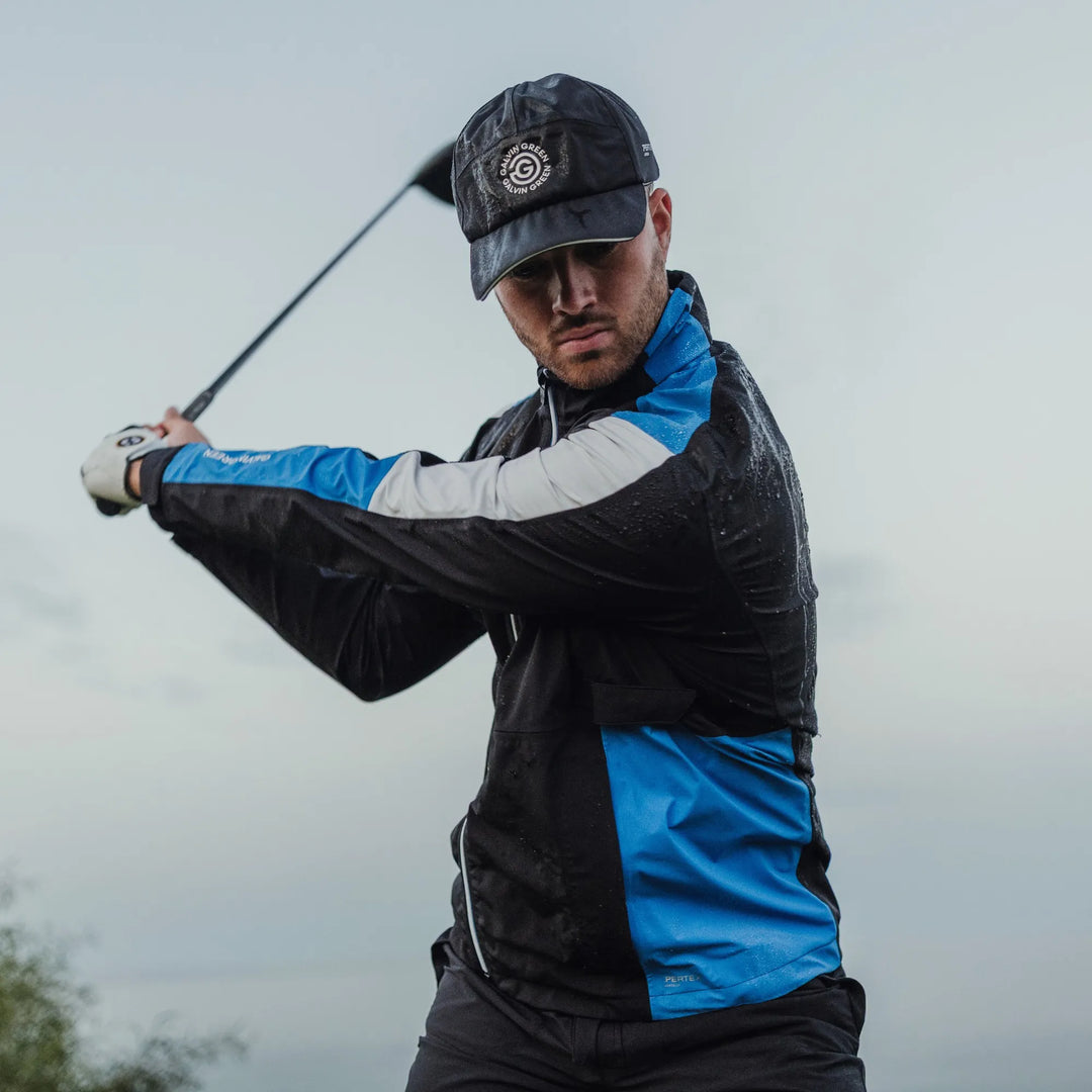 Arlo is a Waterproof Golf Jacket for Men in the color Black/Royal Blue(8)