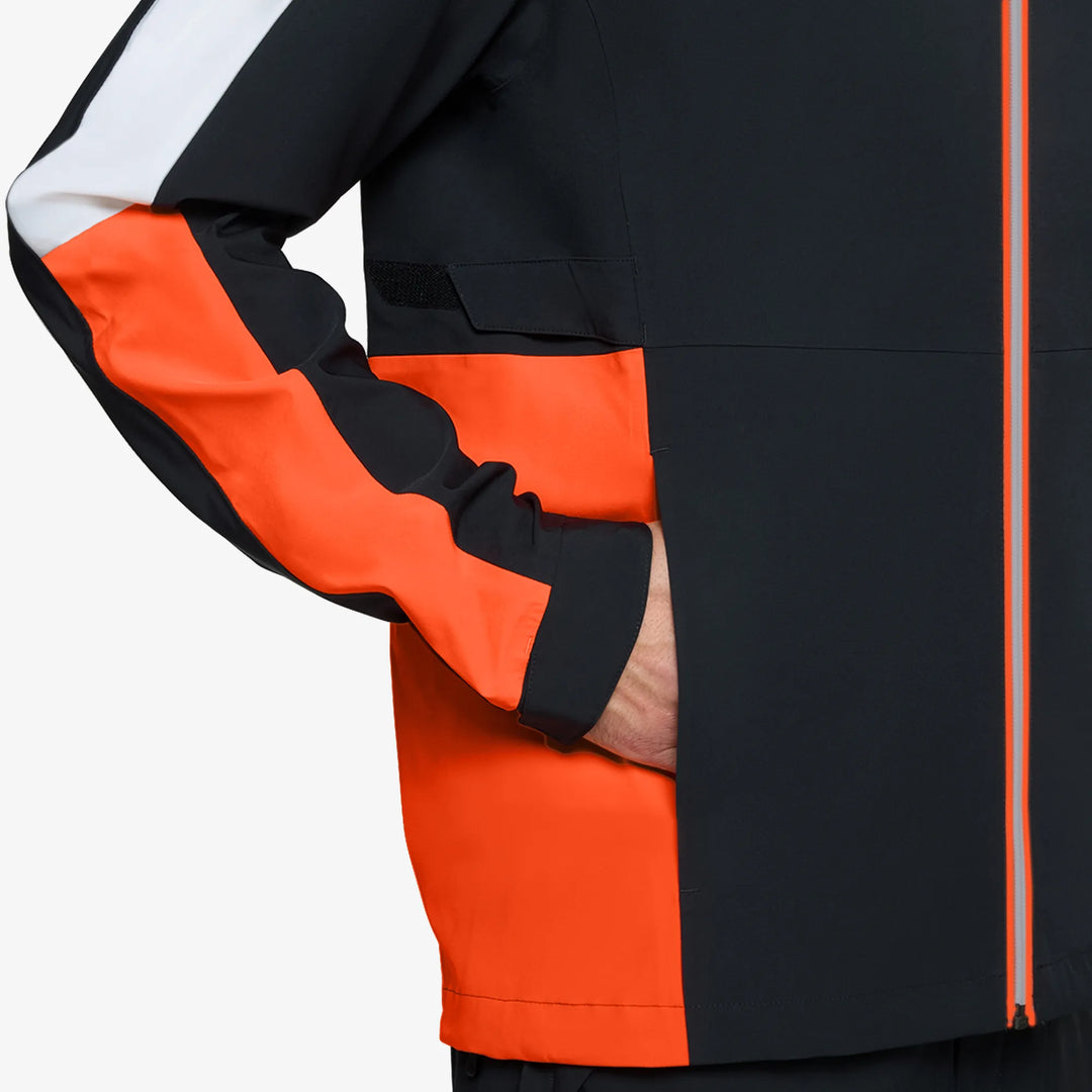 Arlo is a Waterproof Golf Jacket for Men in the color Black/Orange(4)