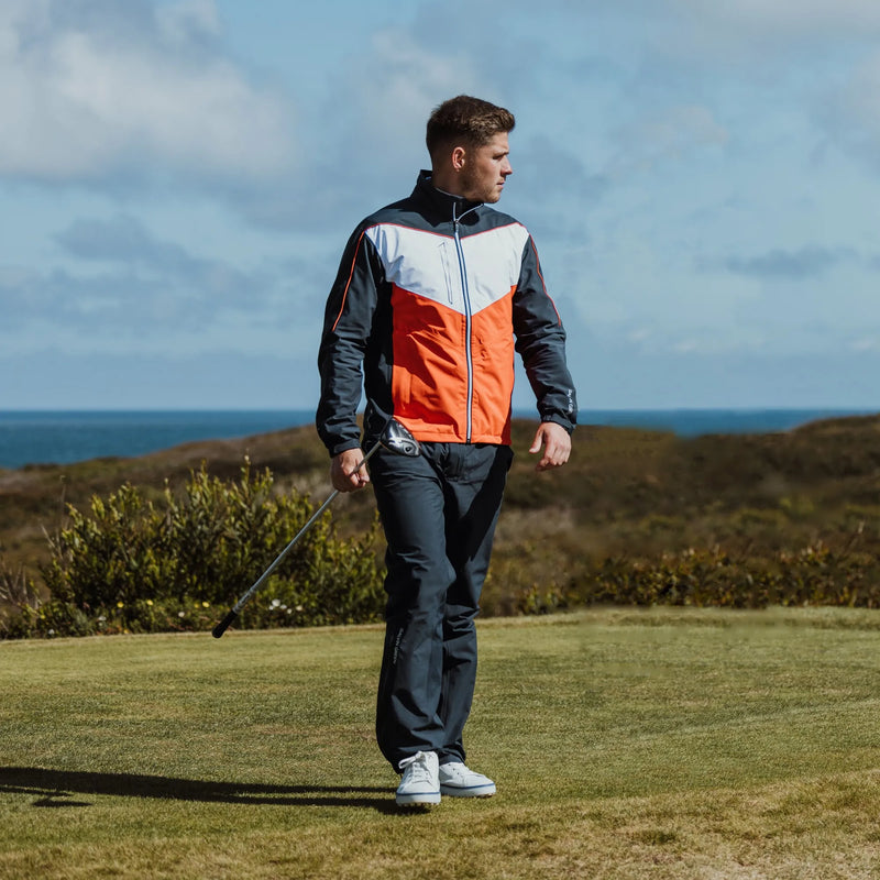 Armstrong is a Waterproof golf jacket for Men in the color Navy/White/Orange (11)
