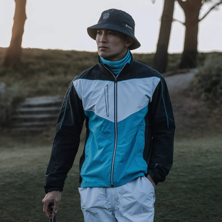 Armstrong is a Waterproof golf jacket for Men in the color Navy/Aqua/White(10)