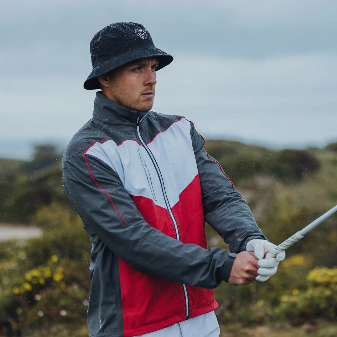 Armstrong is a Waterproof golf jacket for Men in the color Forged Iron/Red/White (10)