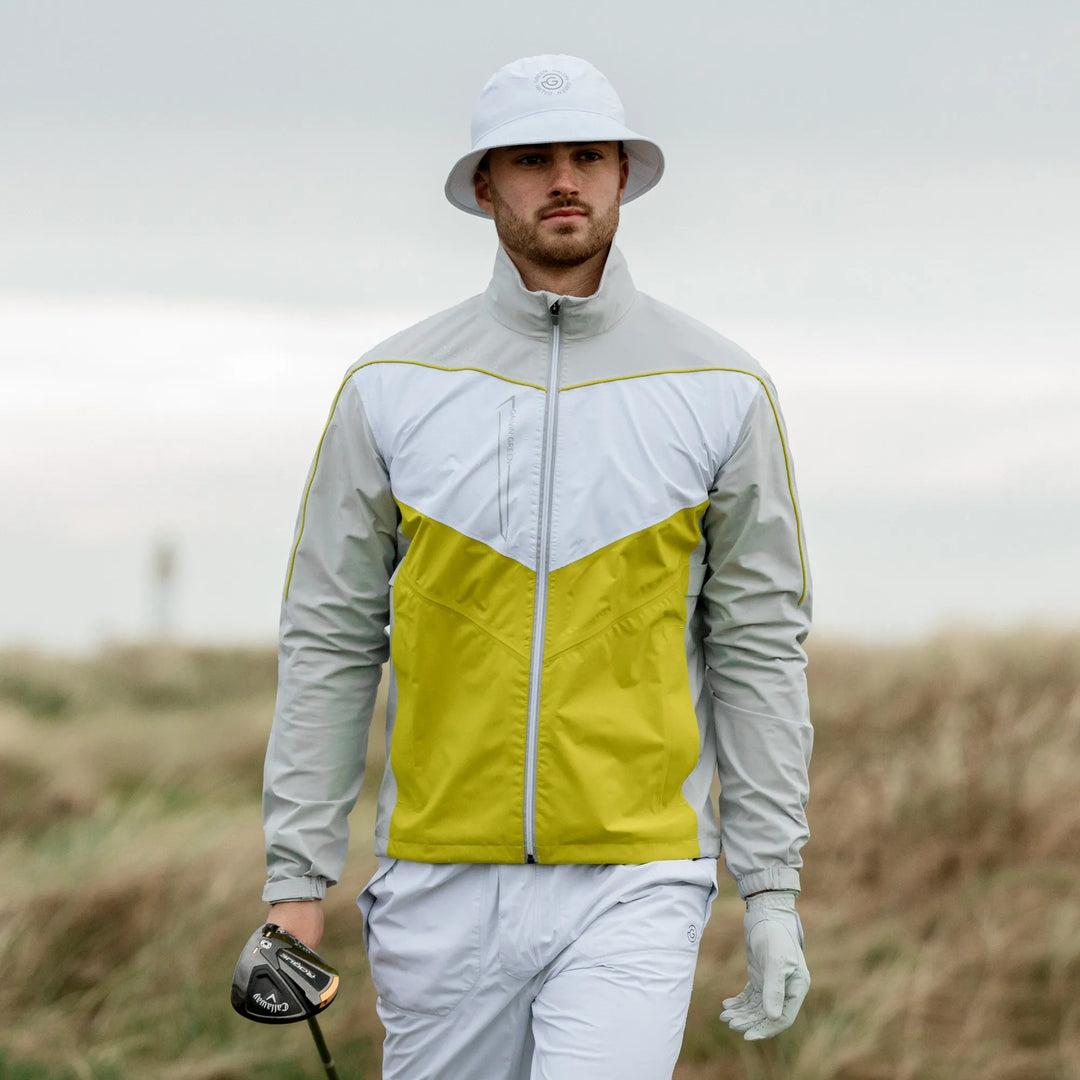 Armstrong is a Waterproof golf jacket for Men in the color Cool Grey/Sunny Lime/White(11)