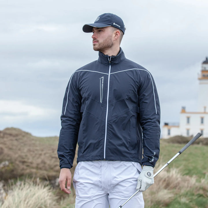 Armstrong solids is a Waterproof golf jacket for Men in the color Navy/White(8)