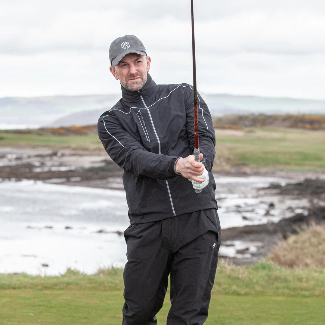 Armstrong solids is a Waterproof golf jacket for Men in the color Black/Sharkskin(8)