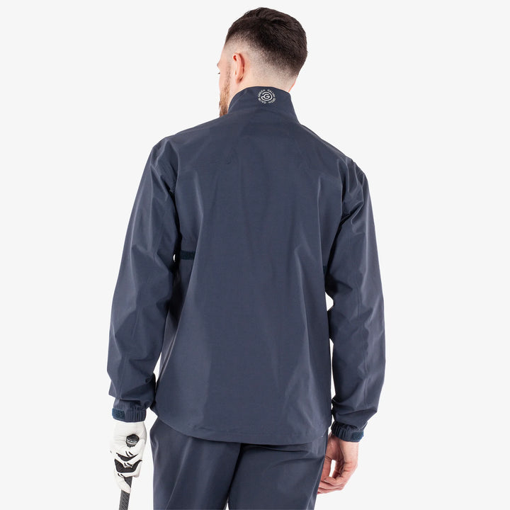 Armstrong solids is a Waterproof golf jacket for Men in the color Navy/White(4)