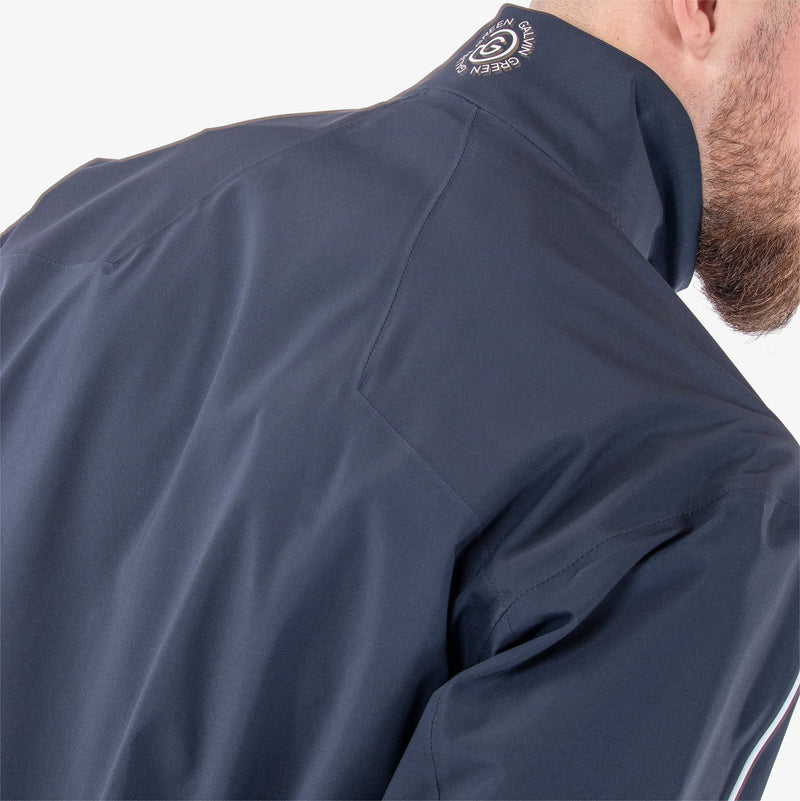 Armstrong solids is a Waterproof golf jacket for Men in the color Navy/White(5)