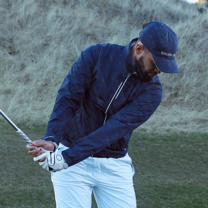 Arvin is a Waterproof golf jacket for Men in the color Navy/White(8)