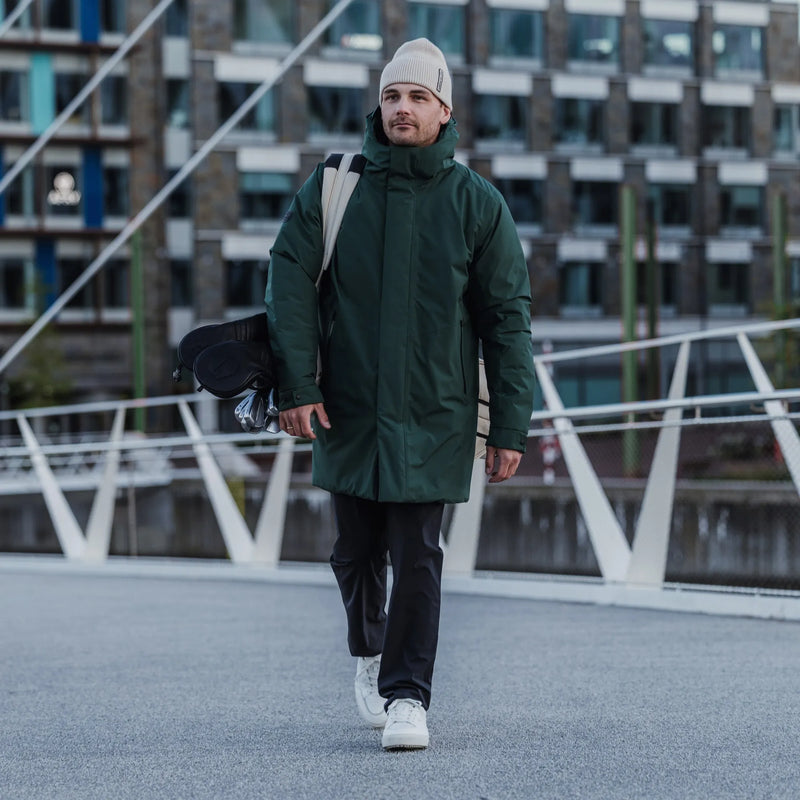 Austin is a Windproof and water repellent insulating golf parka for Men in the color Jungle Green(10)