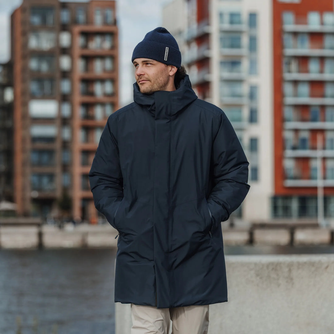Austin is a Windproof and water repellent insulating golf parka for Men in the color Navy(10)