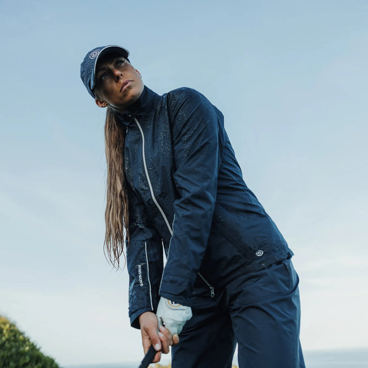 Ava is a Waterproof Golf Jacket for Women in the color Navy(8)