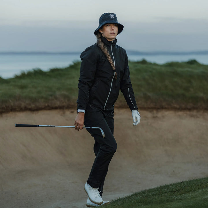 Ava is a Waterproof Golf Jacket for Women in the color Black(9)