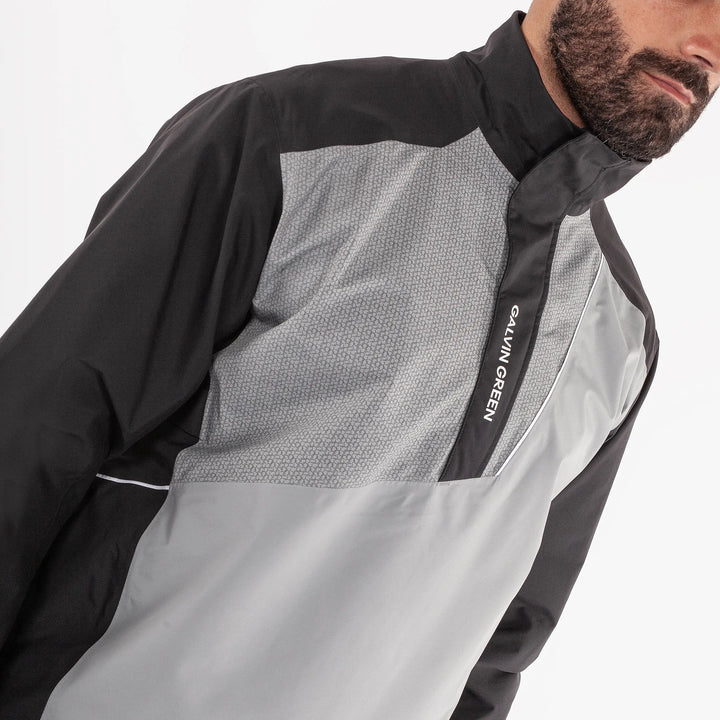 Axley is a Waterproof golf jacket for Men in the color Black/Sharkskin(3)