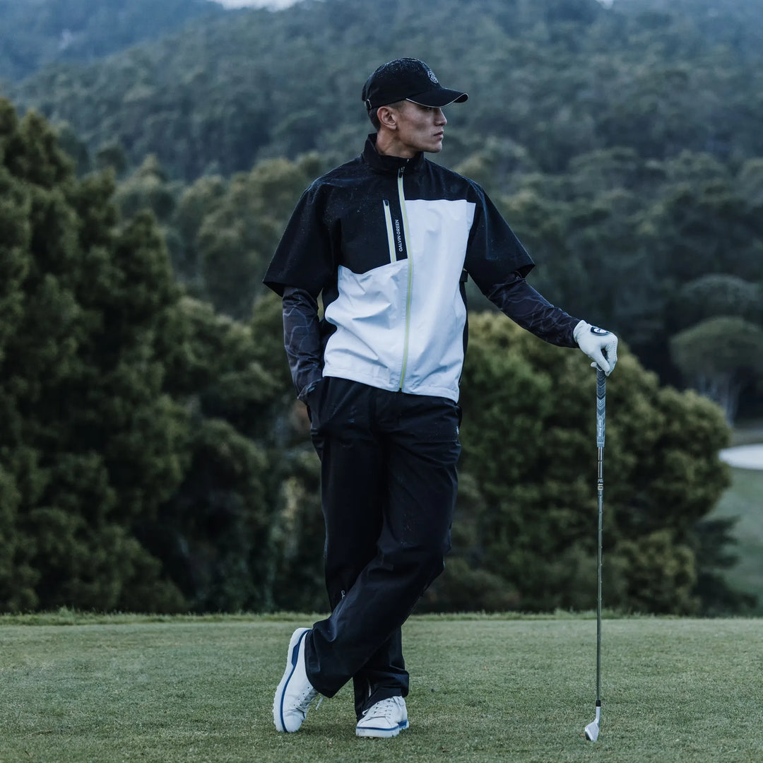 Axl is a Waterproof short sleeve golf jacket for Men in the color Black/White/Sunny Lime(8)