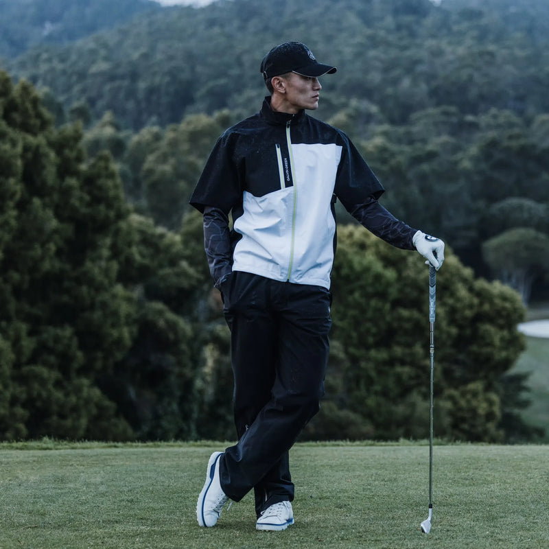 Axl is a Waterproof short sleeve golf jacket for Men in the color Black/White/Sunny Lime(8)