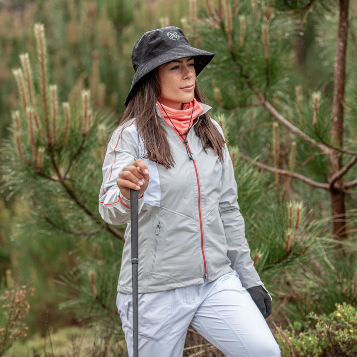 Ally is a Waterproof golf jacket for Women in the color Cool Grey/White/Coral(9)