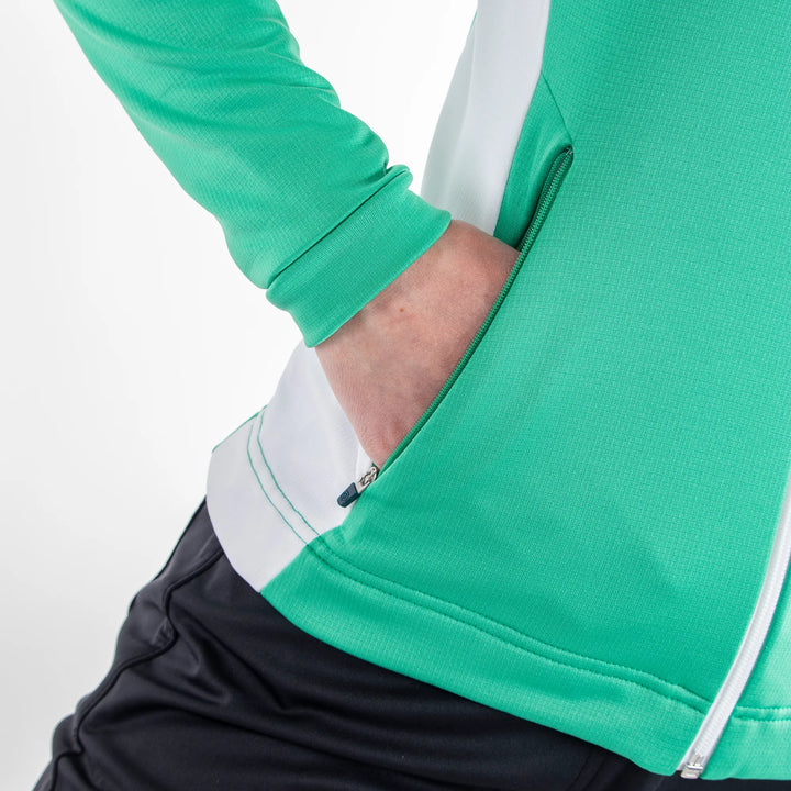 Daisy is a Insulating mid layer for Women in the color Golf Green(4)