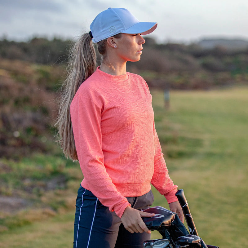 Dalia is a Insulating mid layer for Women in the color Sugar Coral(2)