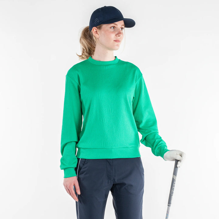 Dalia is a Insulating mid layer for Women in the color Golf Green(1)