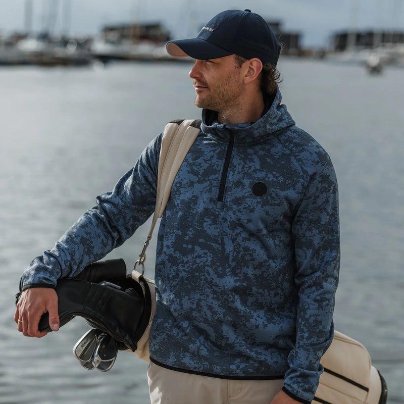 Danby is a Insulating golf mid layer for Men in the color Navy(9)