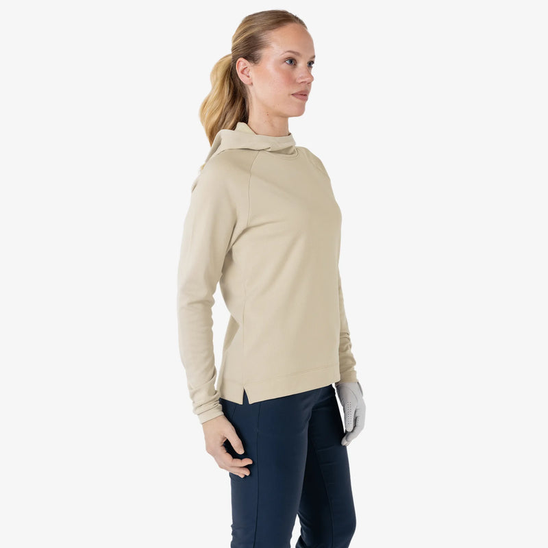 Daphne is a Insulating golf mid layer for Women in the color Sand(3)