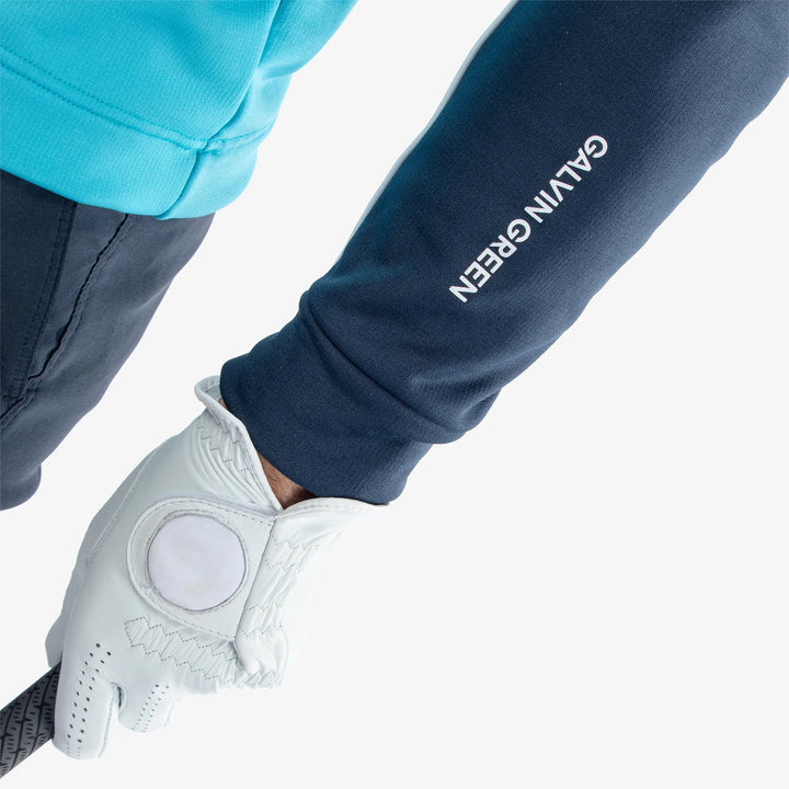 Dave is a Insulating golf mid layer for Men in the color Aqua/Navy(4)