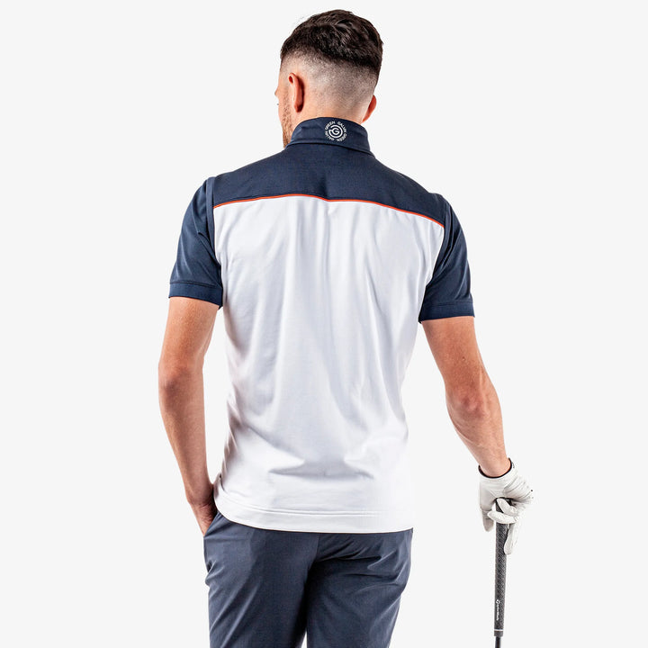 Davon is a Insulating golf vest for Men in the color White/Navy/Orange(4)