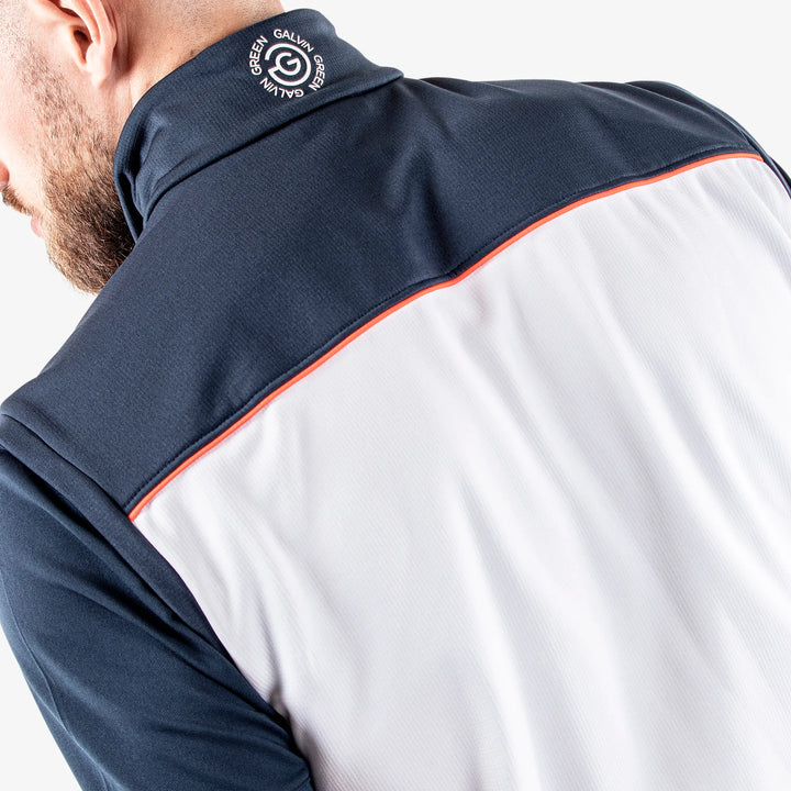 Davon is a Insulating golf vest for Men in the color White/Navy/Orange(5)