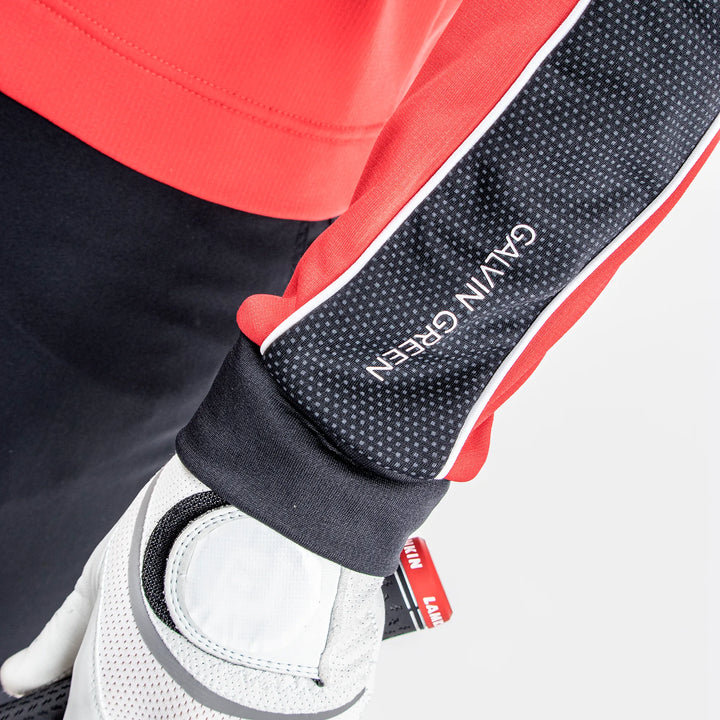 Daxton is a Insulating golf mid layer for Men in the color Red(5)