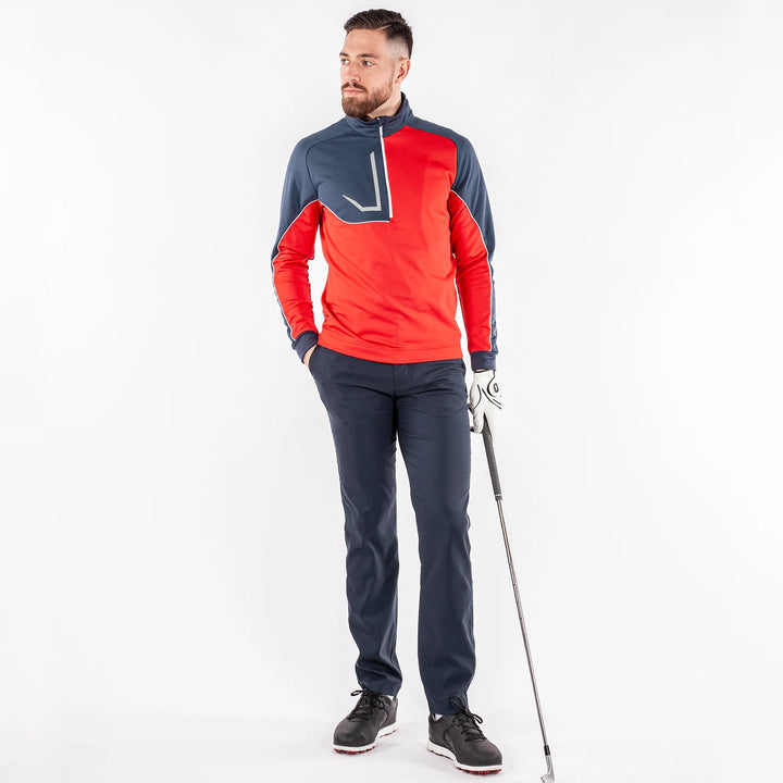Daxton is a Insulating golf mid layer for Men in the color Sporty Red(3)