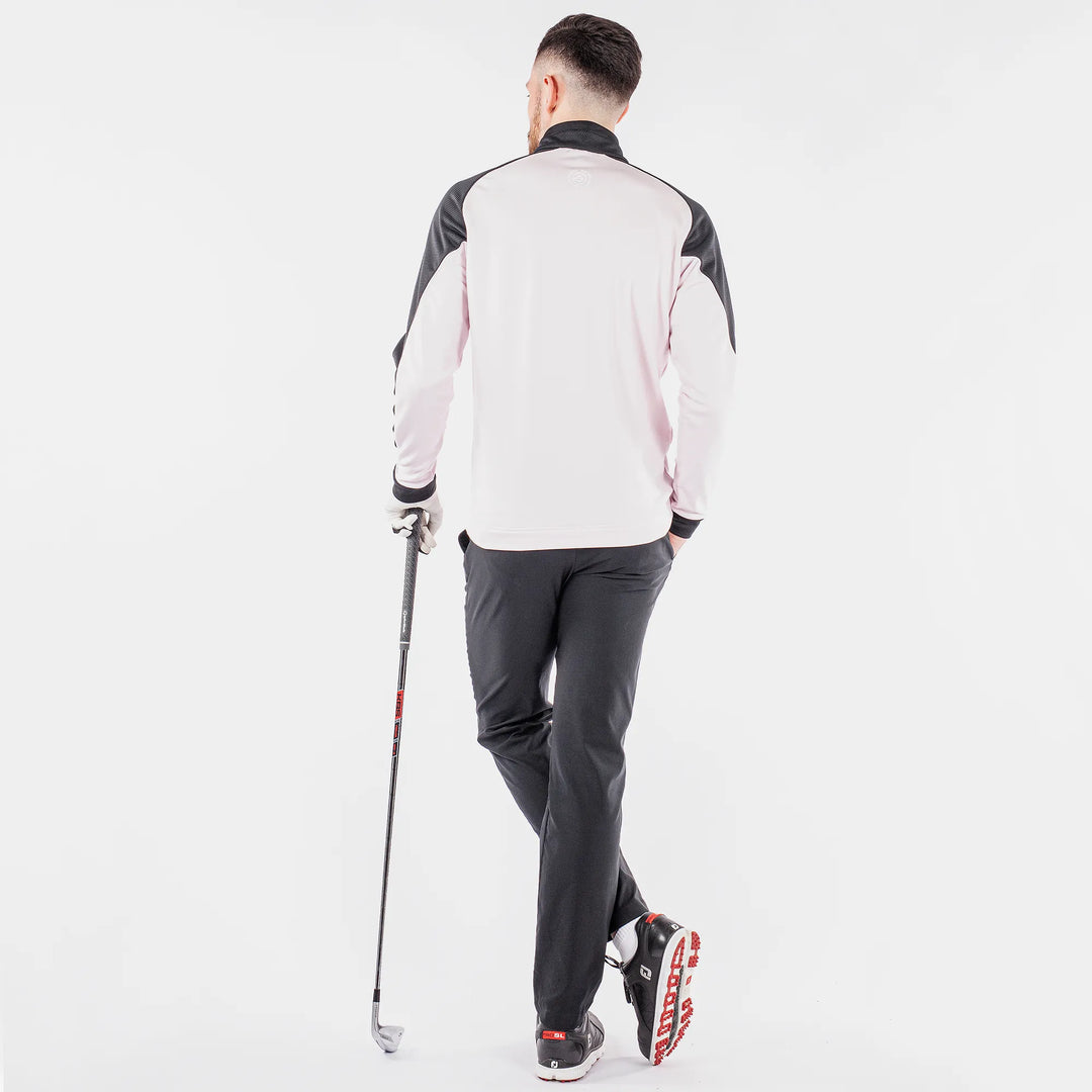 Daxton is a Insulating golf mid layer for Men in the color Fantastic Pink(7)