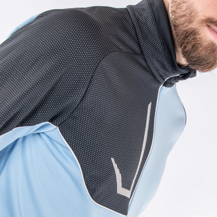 Daxton is a Insulating golf mid layer for Men in the color Amazing Blue(4)