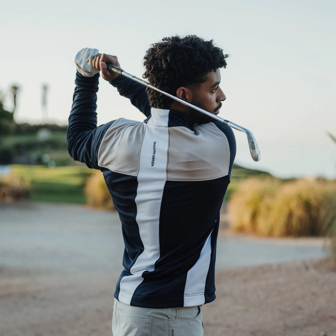 Dean is a Insulating golf mid layer for Men in the color Sand/Navy/white(8)