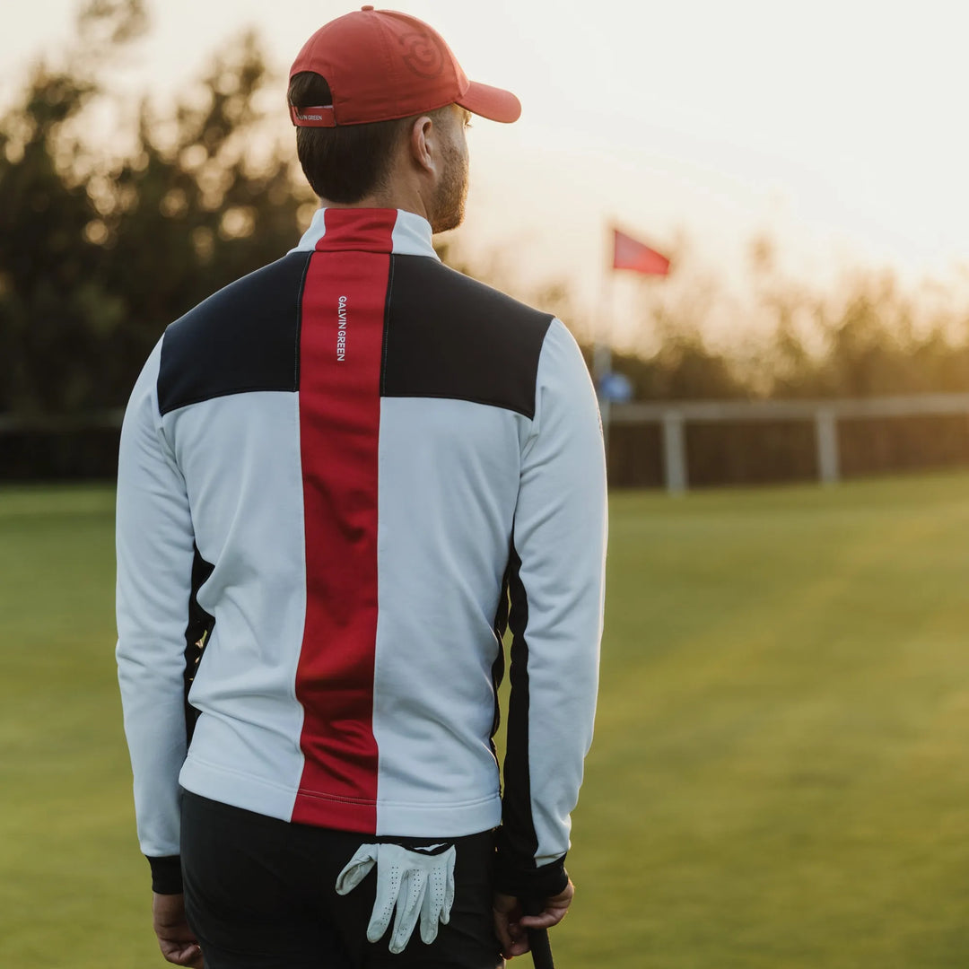 Dean is a Insulating golf mid layer for Men in the color White/Navy/Red(8)