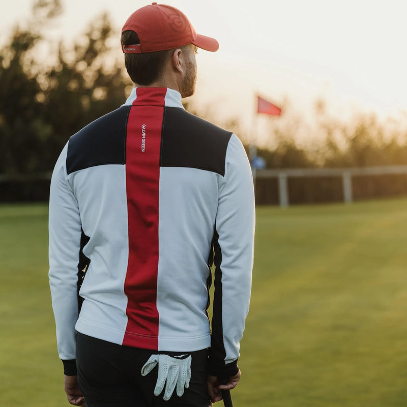 Dean is a Insulating golf mid layer for Men in the color White/Navy/Red(8)