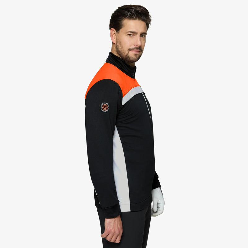 Dean is a Insulating golf mid layer for Men in the color Black/White/Orange(3)
