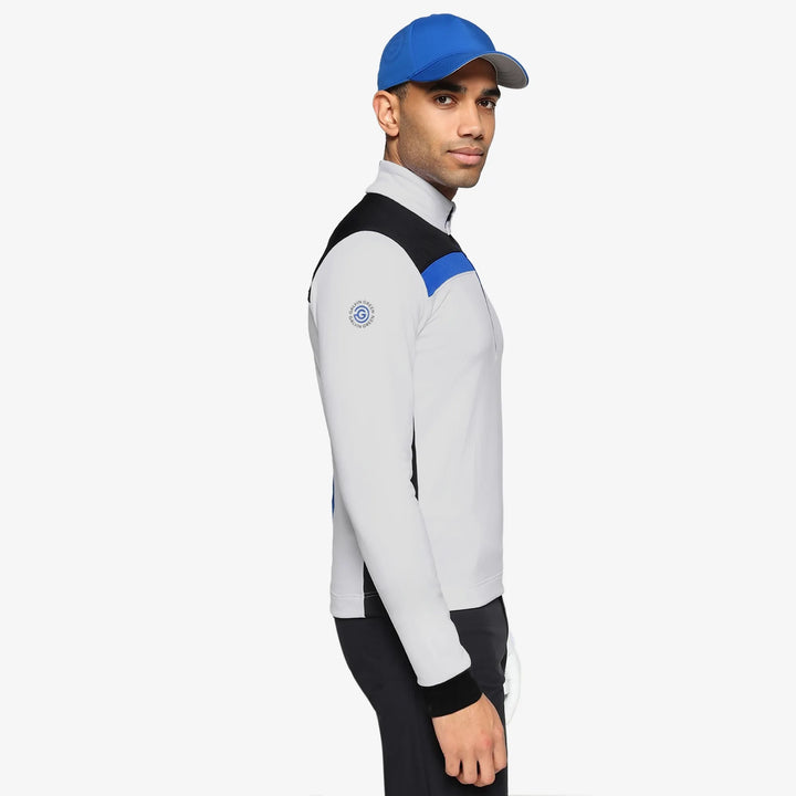 Dean is a Insulating golf mid layer for Men in the color Black/White/Royal Blue(3)