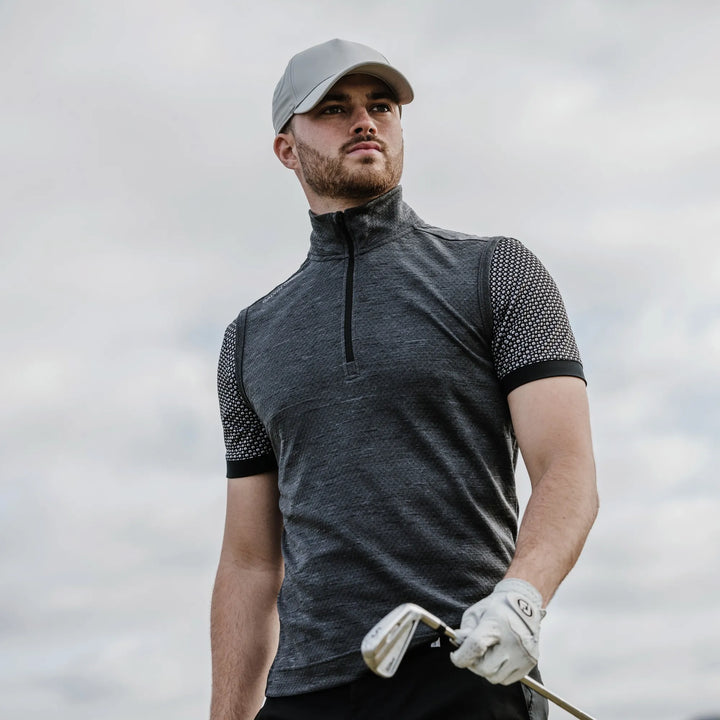 Del is a Insulating golf vest for Men in the color Black Melange(8)