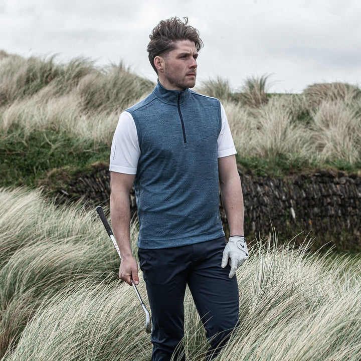 Del is a Insulating golf vest for Men in the color Blue Melange (8)