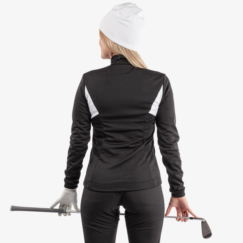 Destiny is a Insulating golf mid layer for Women in the color Black/White(4)