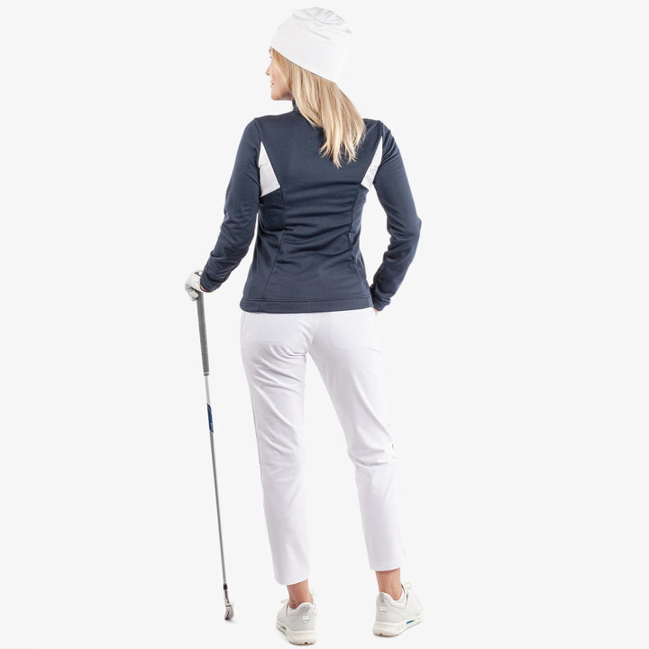 Destiny is a Insulating golf mid layer for Women in the color Navy/White(6)